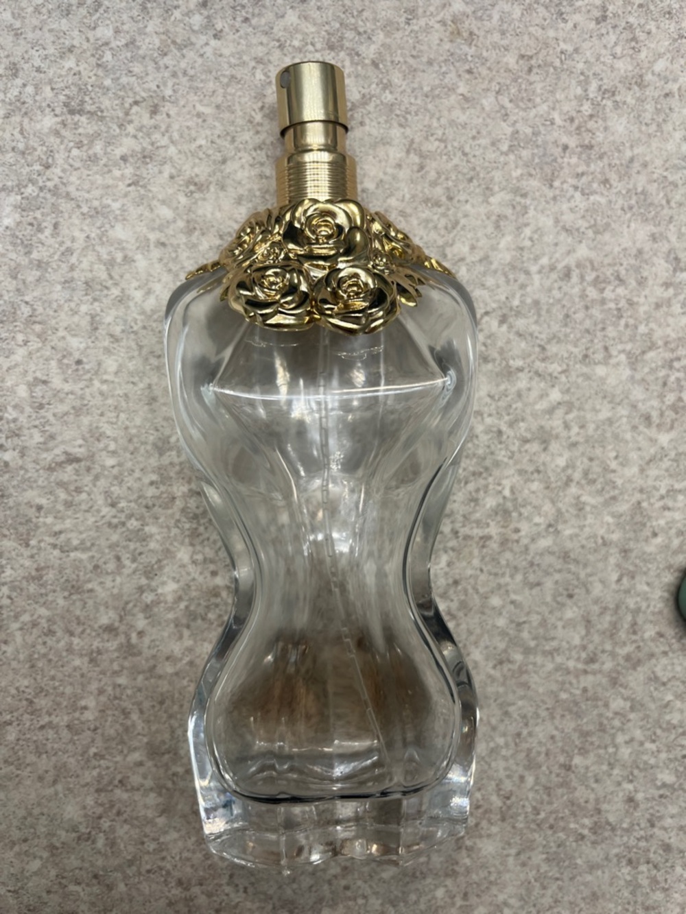 Refillable glass Paul Gaultier Clear Glass Torso Spray Bottle with Gold Rose